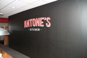 antones kitchen wall with logo