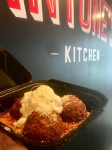 meatballs with parmesean and sauce by antones logo