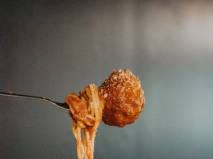 spaghetti and meatball on fork